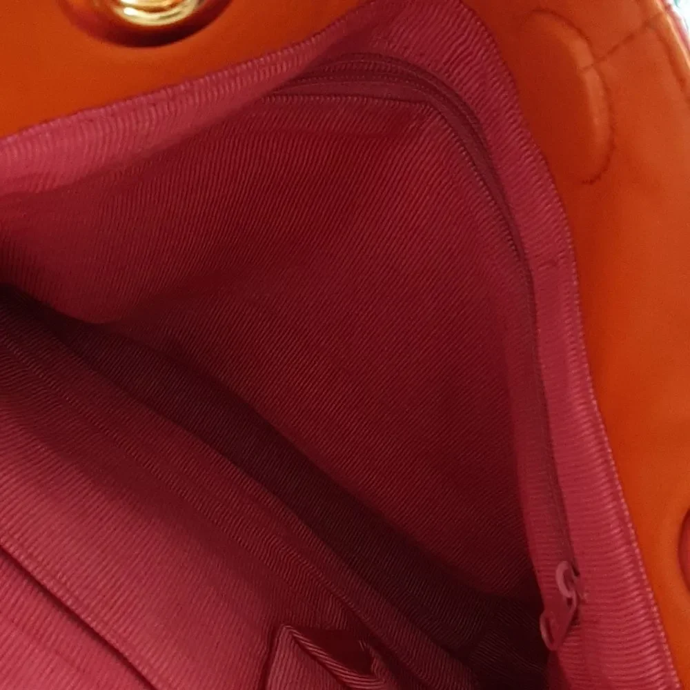 Pink and orange leathershoulder handbag